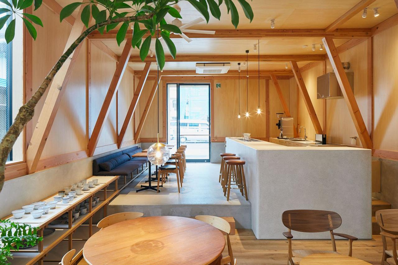 Modern Japanese Café with a Cozy Residence Above Makes a Woodsy Impression  | Decoist
